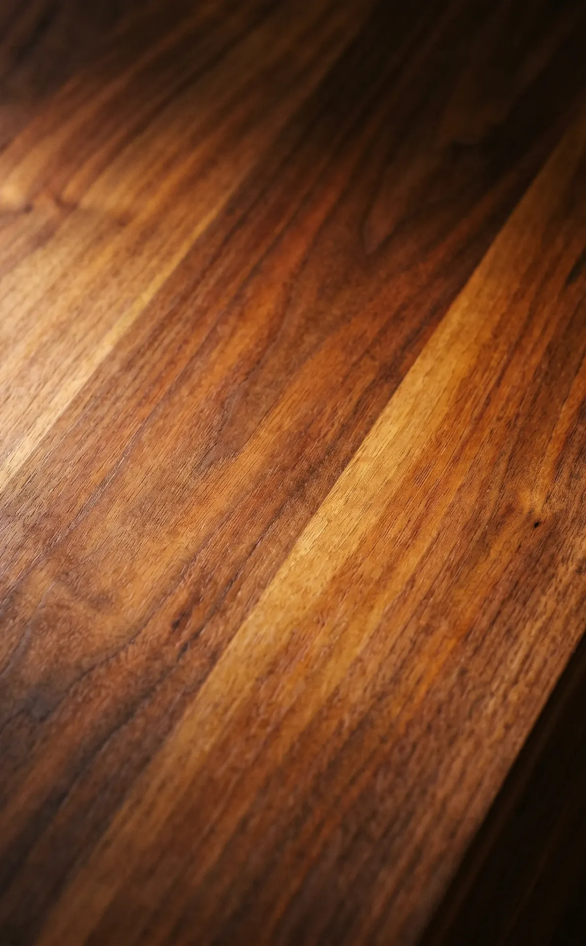 Teak grain in warm light, close up.